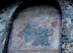 3. Affresco del secolo XVI raffigurante una Modonna in trono col Bambino e angeli.