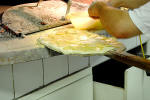 23. ...e voil,  pronta a entrare in forno un'ottima pizza con le patate!
