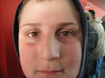 38. Faccia in Foto.