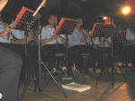 44. Mentre in piazza si mangia e si beve (e si fuma), sul palco la Banda di Anticoli (e non solo di Anticoli) si produce in un applauditissimo concerto.