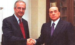 Le belle facce del duopolio e del baratto: Walter "Togliattino" Veltroni e Silvio Berlusconi. Indovinello: chi dei due si sentiva pi furbo, in quel momento?
