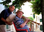 46/1000, "Zampogne in piazza delle Ville", 9 agosto 2009.