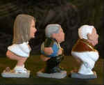 Piccola processione di caganer guidata da Benedetto XVI