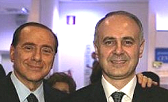 Per la serie "Cerone in faccia e Ceroni... sotto mano": Silvio Berlusconi e Remigio Ceroni.