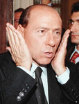 Per la serie "Date a Silvio quel ch di Silvio e a Mammona quel ch di Mammona": Silvio Berlusconi e Tarcisio Bertone.