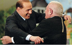 Il Berlusconi e il Gelmini si abbracciano sempre. Ma a nessuno dei due piacciono gli uomini. E il Berlusconi lha anche dichiarato.